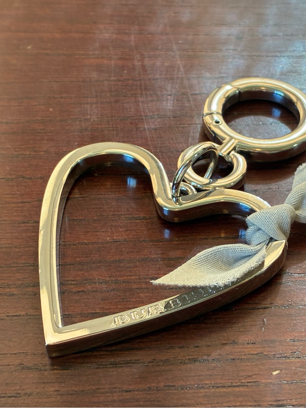 Burberry Silver Heart Key Charm with Light Gray Ribbon and box